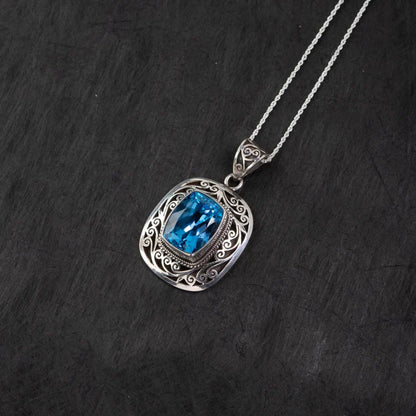 Blue Topaz Filigree Silver Pendant – Clarity & Communication