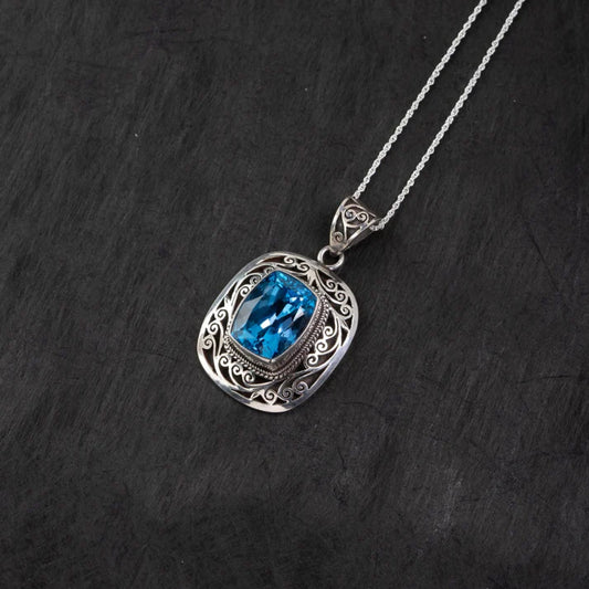 Blue Topaz Filigree Silver Pendant – Clarity & Communication