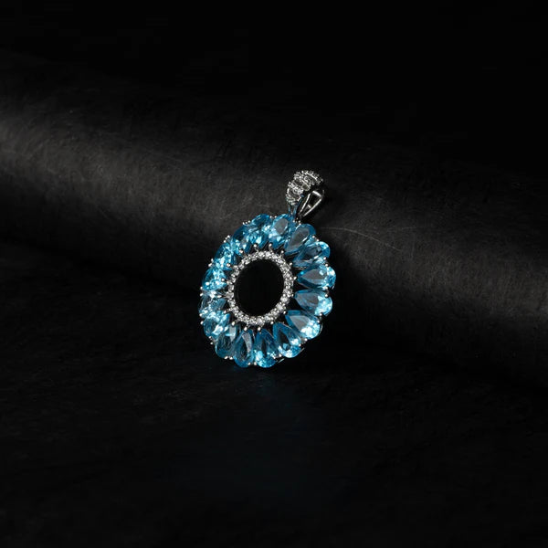Blue Topaz Halo Circle Silver Pendant – Clarity & Expression