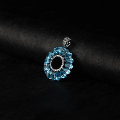 Blue Topaz Halo Circle Silver Pendant – Clarity & Expression