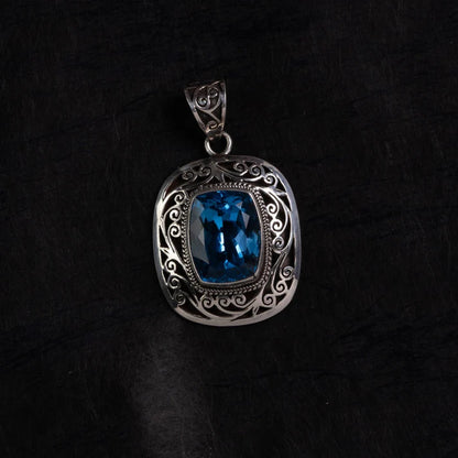 Blue Topaz Filigree Silver Pendant – Clarity & Communication