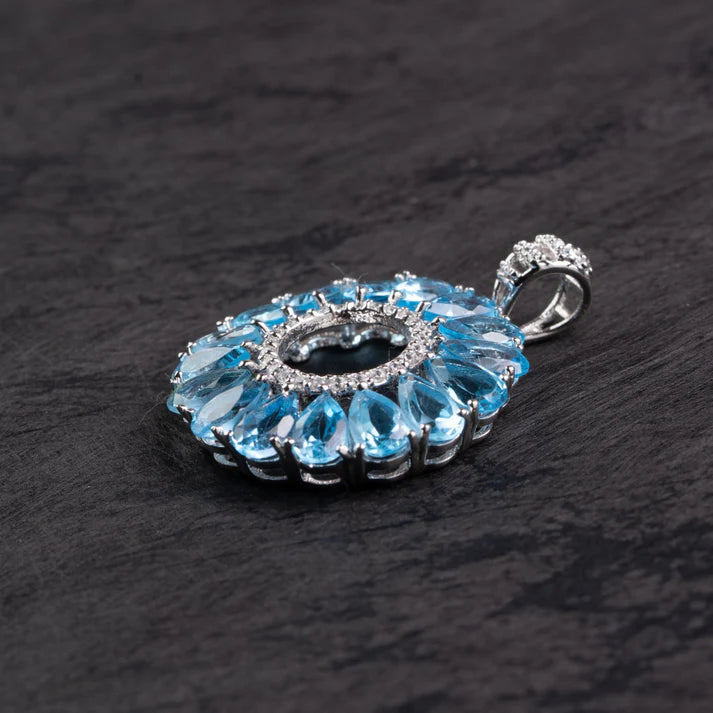 Blue Topaz Halo Circle Silver Pendant – Clarity & Expression